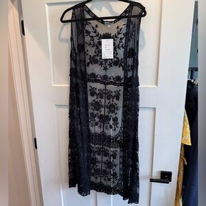 NWOT Rebellion Black Duster Vest with an Intricate Lace Design